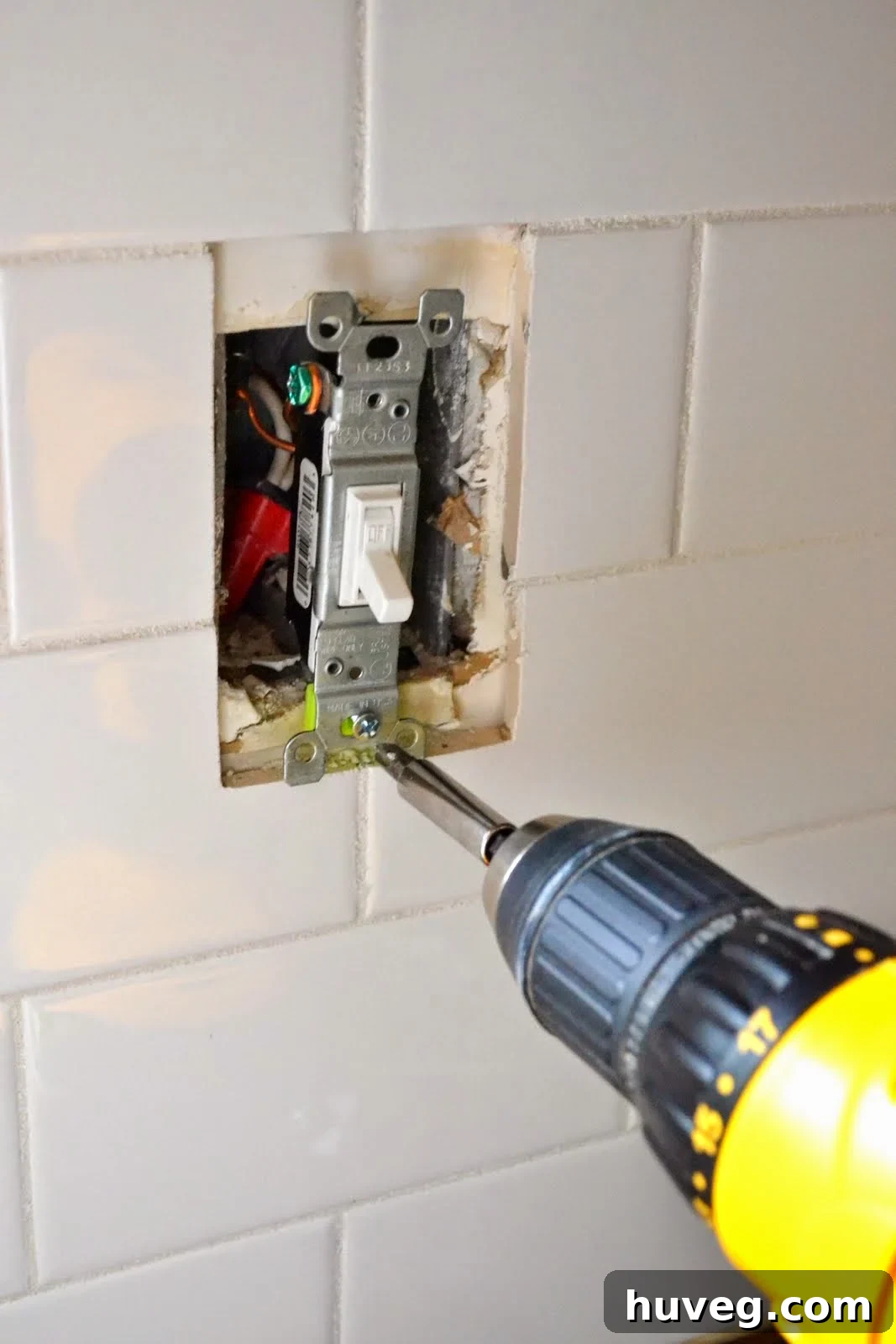 Screwing the switch in
