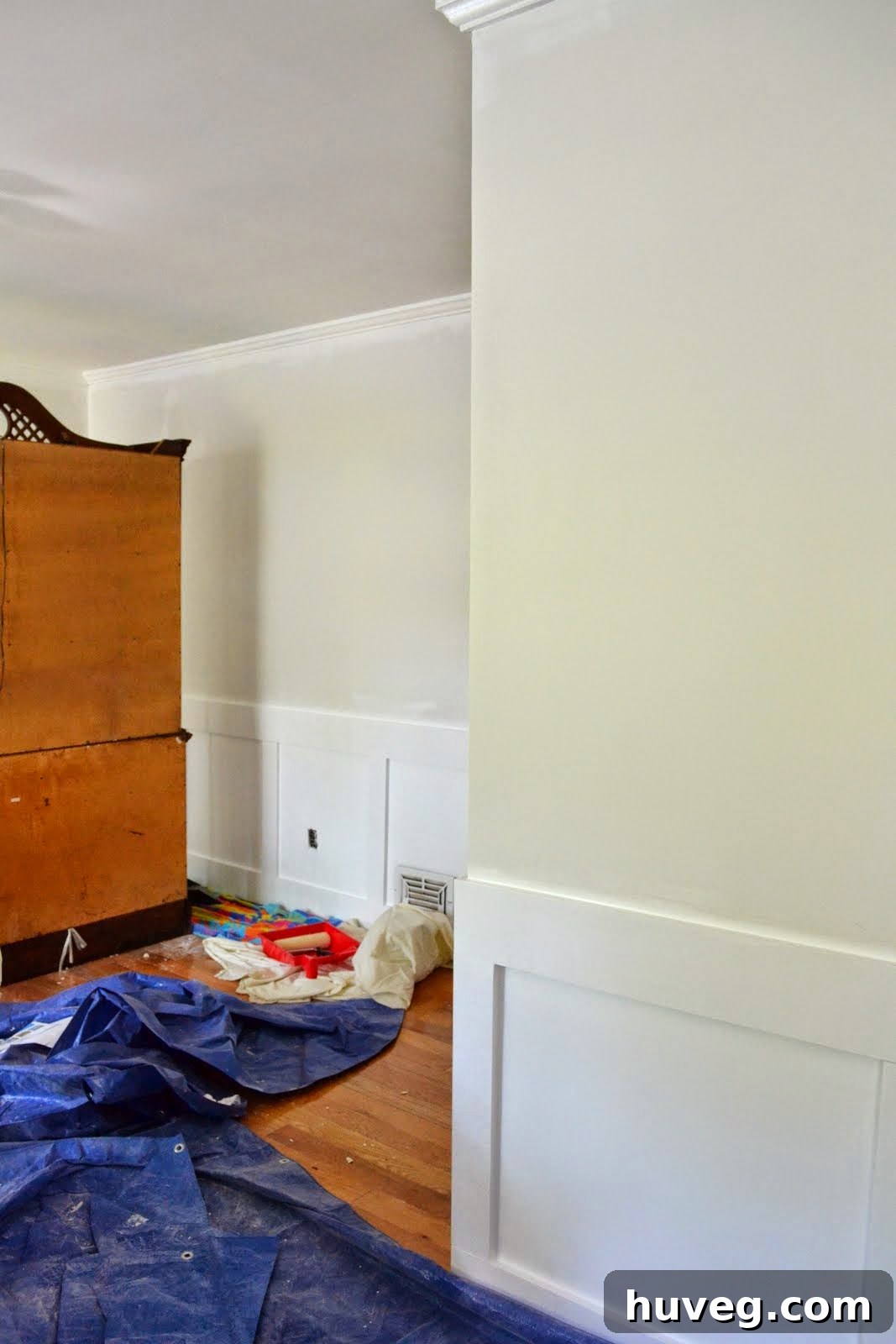 White wainscoting freshly painted, showing clean lines and smooth coverage