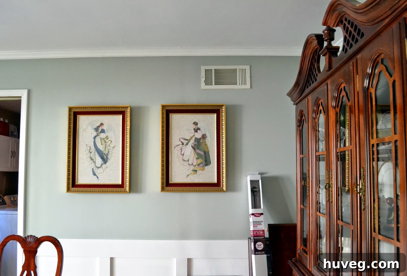 Dining room corner showing furniture against the newly painted wall