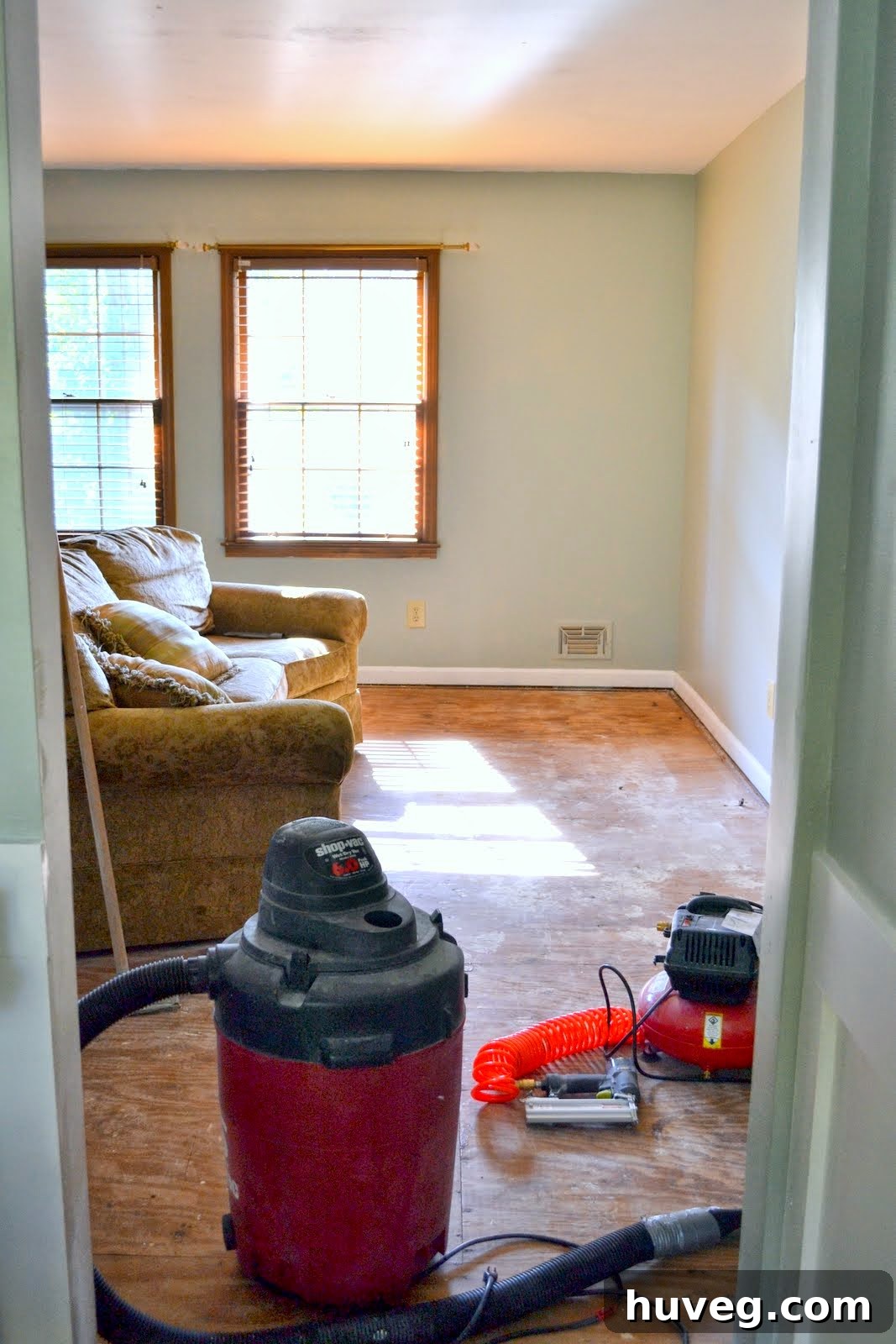 Living room area featuring new paint, expanding the home makeover