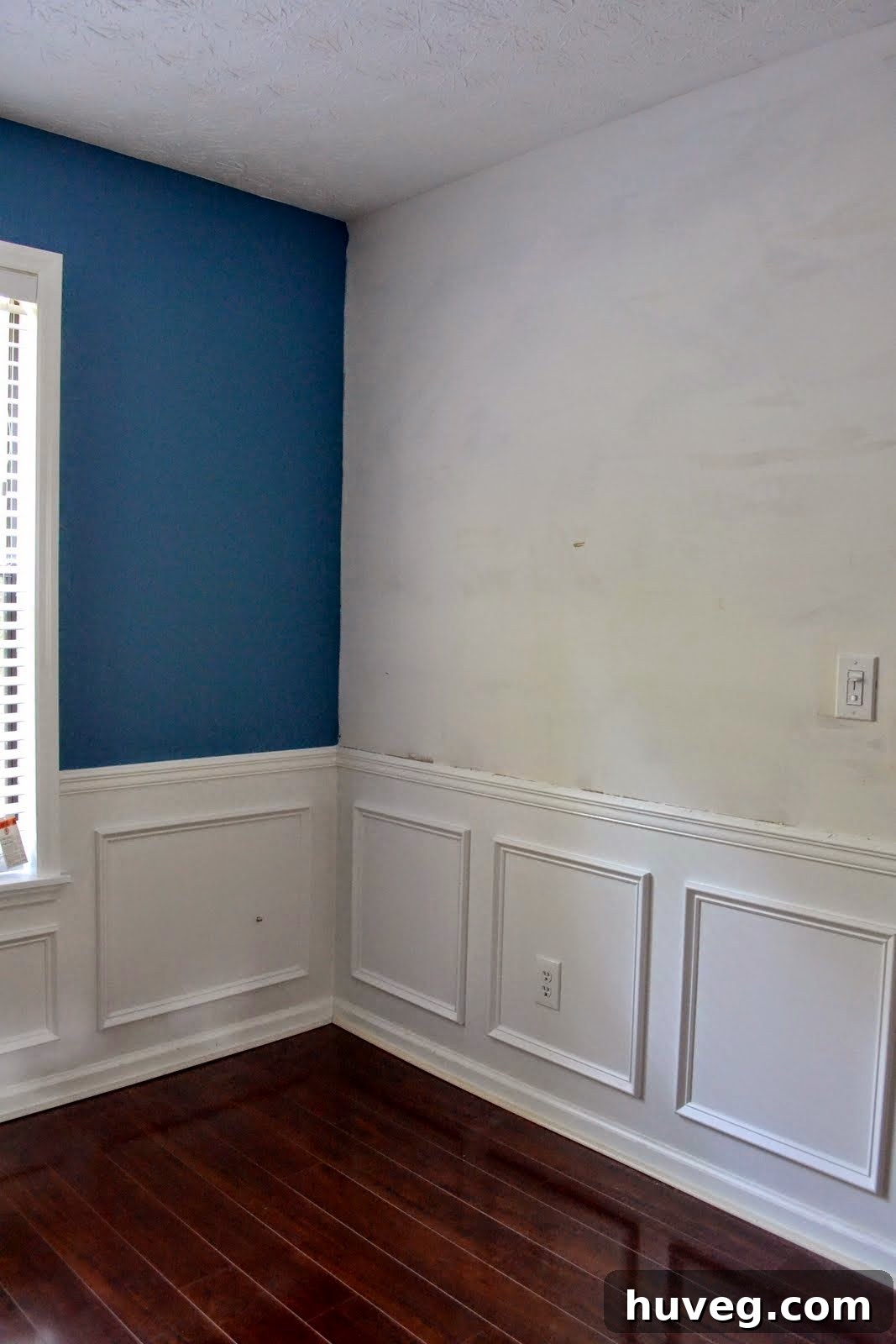 A close-up of a painted wall in the dining room, showing the texture and finish.