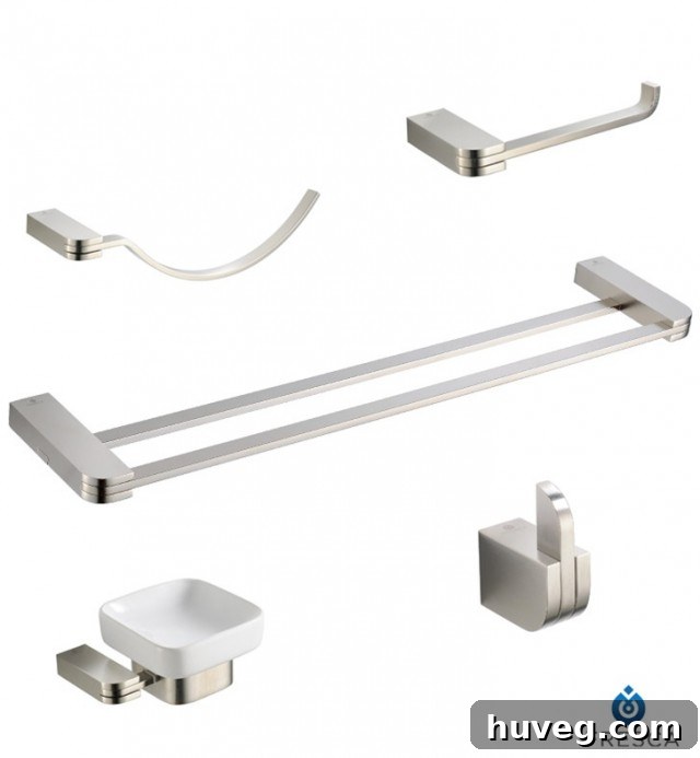 Modern bathroom accessories from Fresca Solido series, including a towel bar, toilet paper holder, and robe hook.
