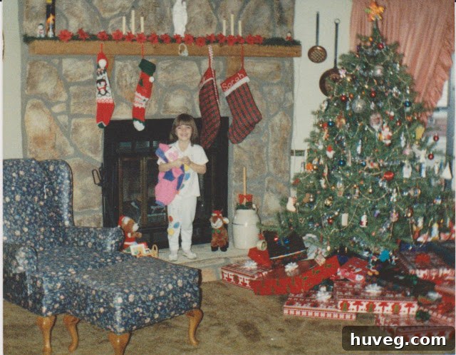 Young Sarah at Christmas with Uncle Knick-Knack, capturing a moment of family humor and tradition.