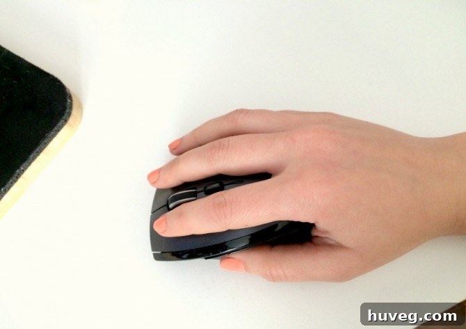 A computer mouse on a desk, symbolizing the designer's work