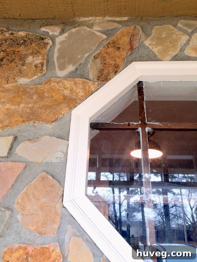 Clean window glass after paint removal