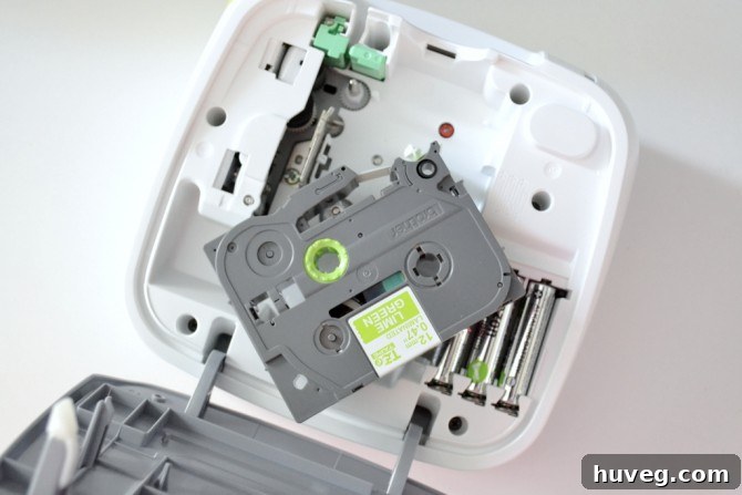 Brother P-Touch label maker with various tape cartridges.