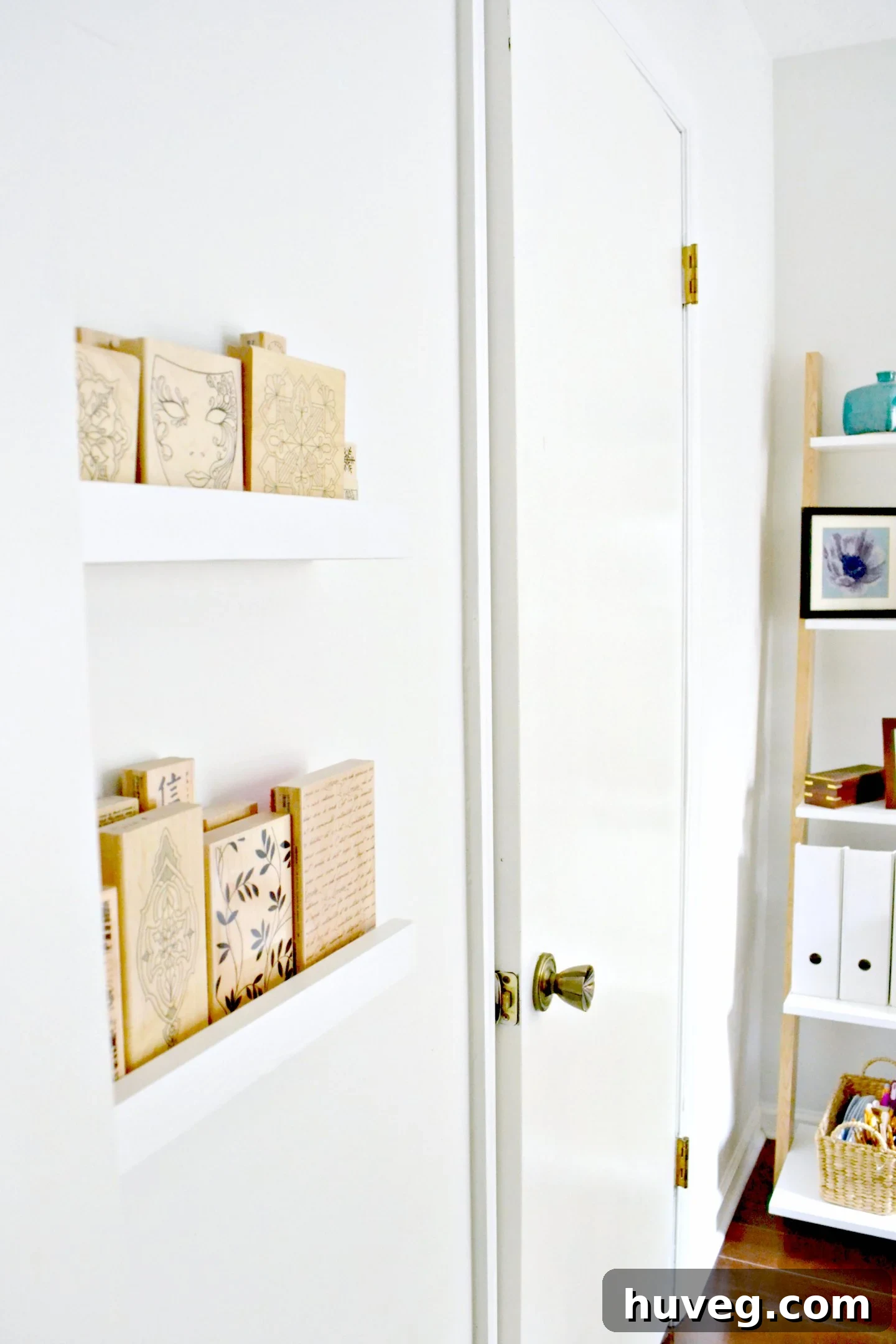 DIY storage ledges constructed from 1x3 lumber, designed for narrow spaces and painted white.