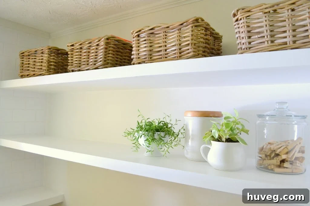 Finished long thin floating shelves in laundry room
