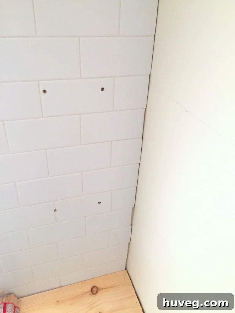 how to drill into tile for wall anchors