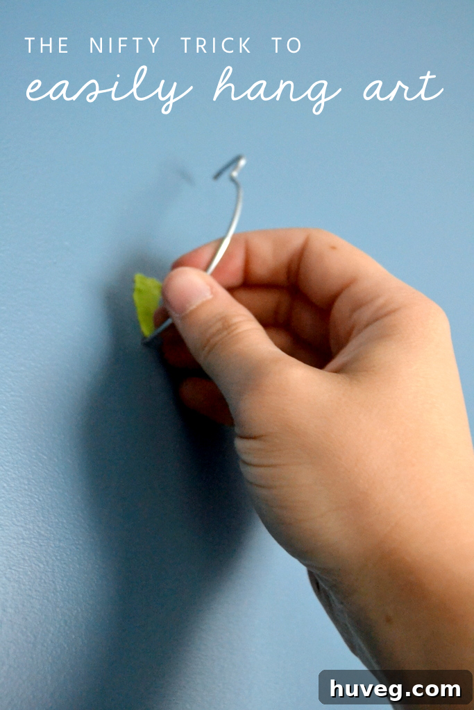 easily hang art with this simple tool