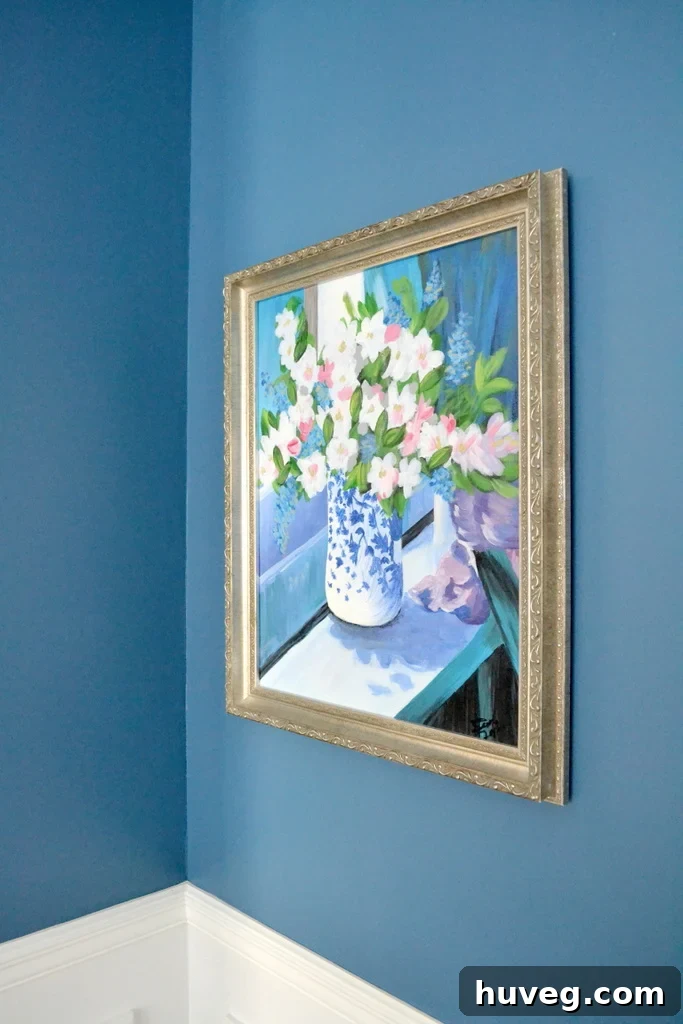 Close-up of the framed floral art, revealing intricate brushstrokes and its profound sentimental significance.