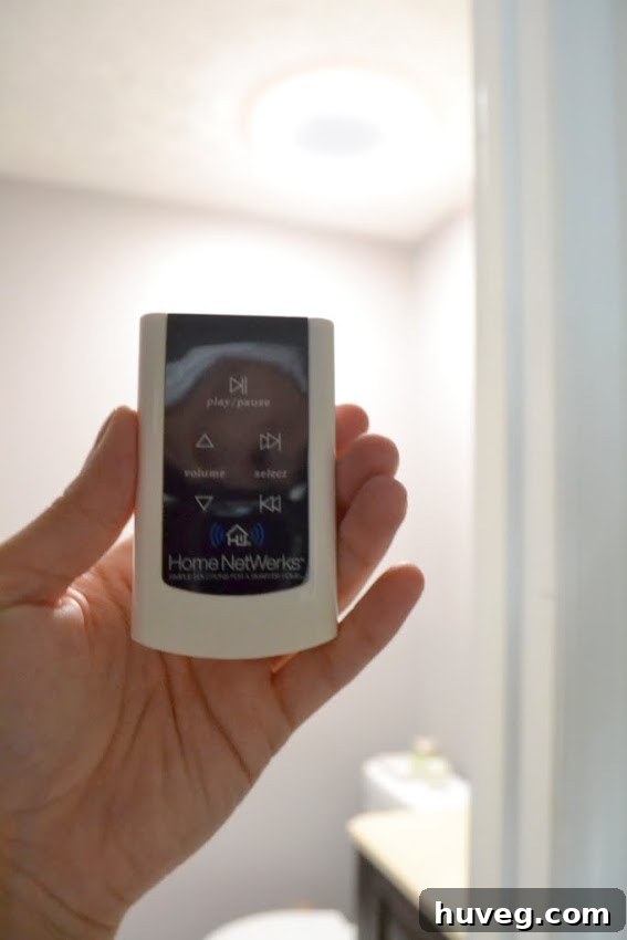 Man testing remote control with a smartphone camera