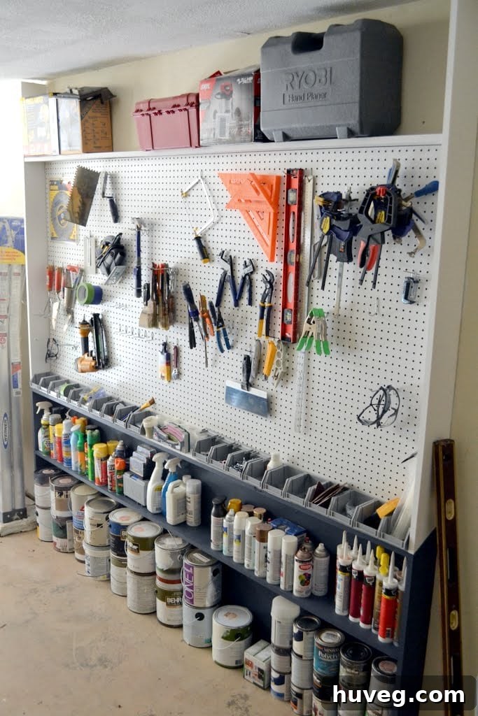 Finished pegboard wall with tools neatly organized