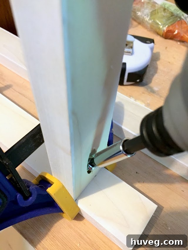 Pre-painting and drilling pocket holes on step stool supports