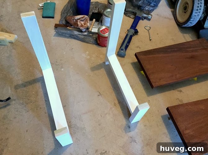 Assembling the step stool base with legs and supports
