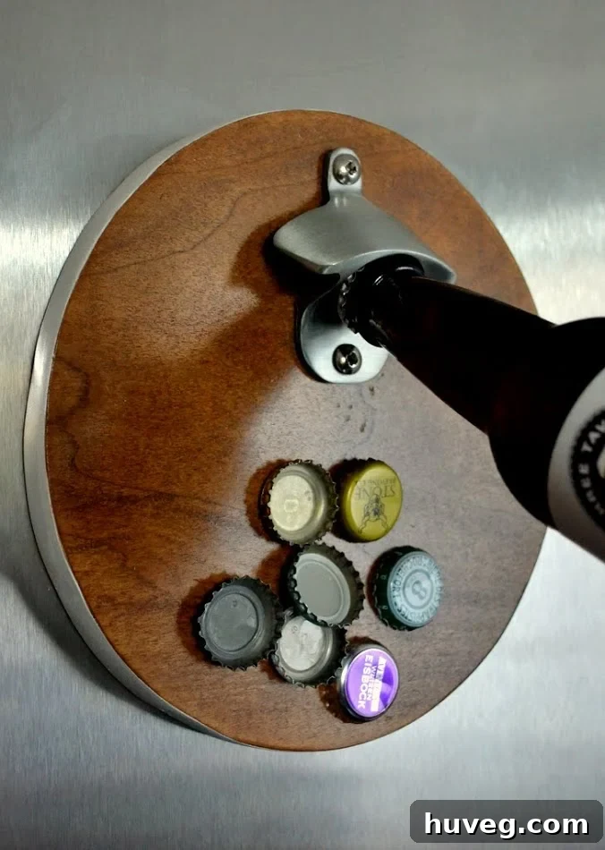 Stylish magnetic wall-mounted bottle opener made from scrap wood, adding character to kitchen decor.