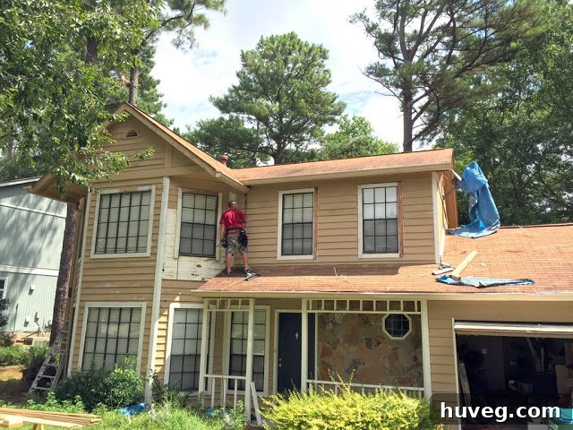 Professional Siding Repair in Progress