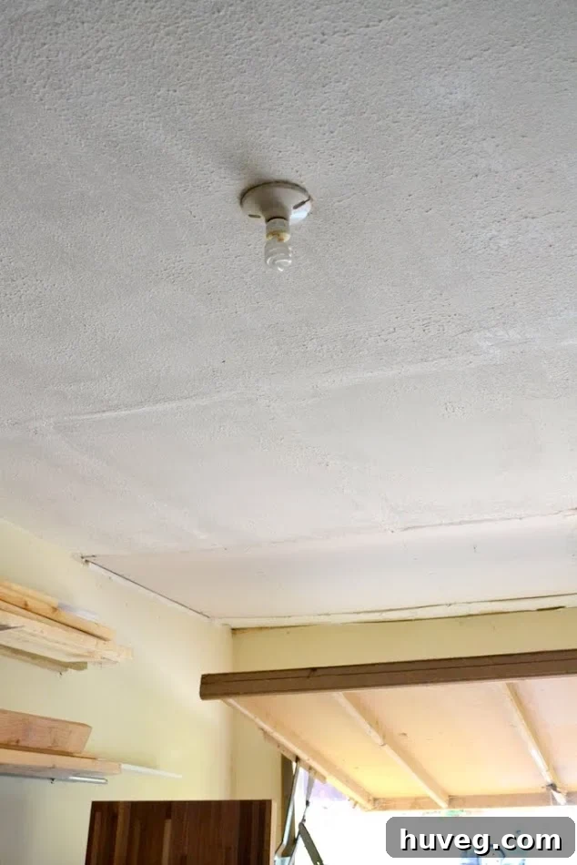 Dimly lit garage with a single old light bulb