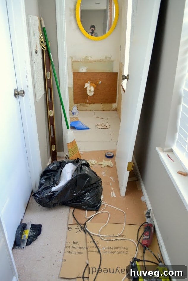 Primary Bathroom Floor Tile Installation In Progress