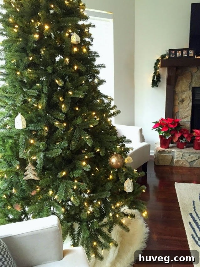 Freshly decorated Christmas tree with a cozy new base
