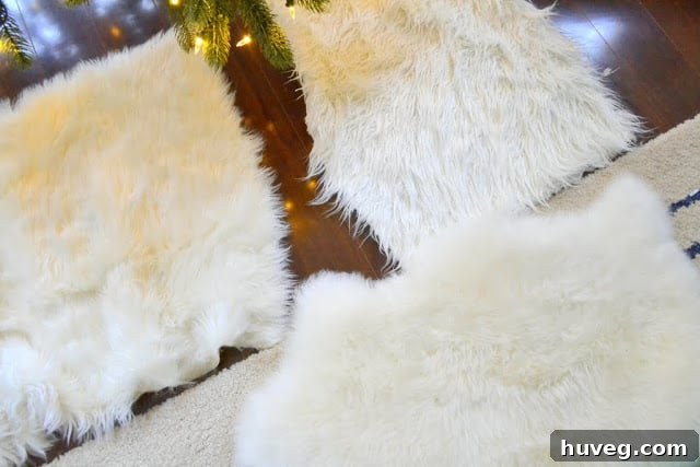 Comparison shot of a real sheepskin rug next to a faux fur fabric piece