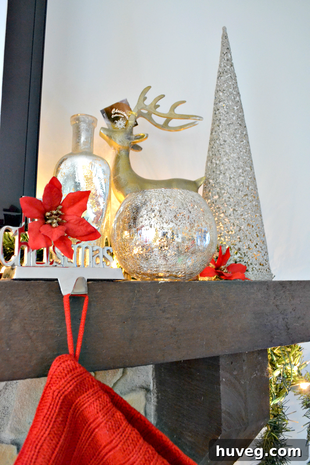 christmas mantel right side with candles and festive accents