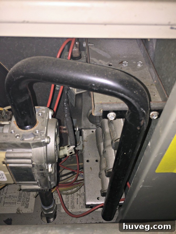 Interior view of a horizontal furnace unit, revealing the complex components involved in home heating.