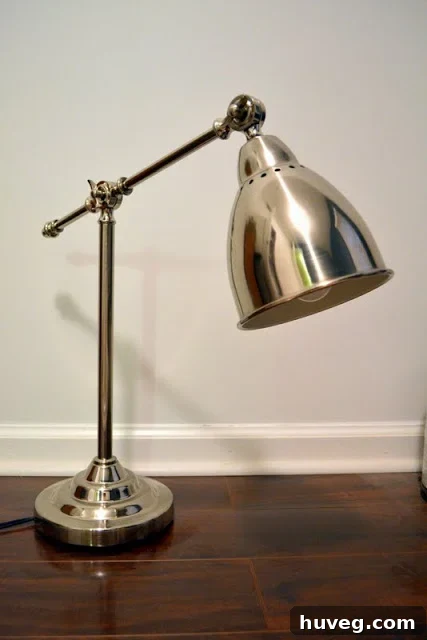 IKEA Barometer work lamp in its original silver finish, a budget-friendly find waiting for a DIY makeover.