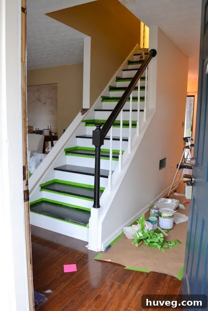 Front door view showing the painted stairs leading up