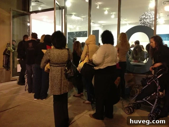 Crowd waiting in line for the Young House Love book signing event in cold weather.