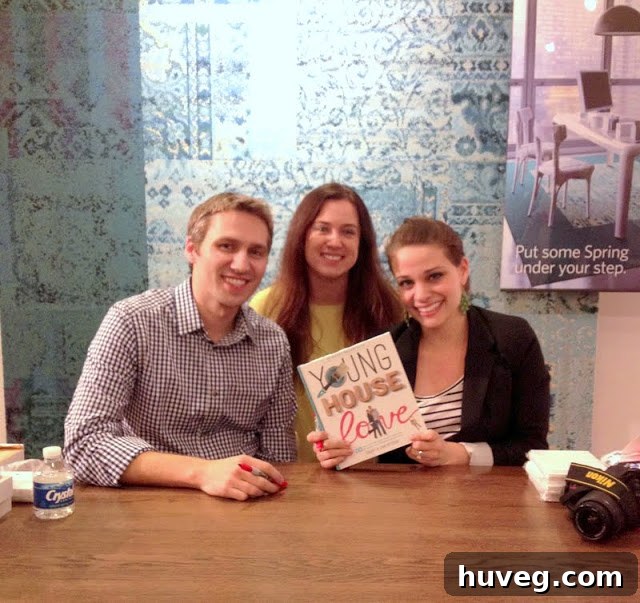 Author's fuzzy photo with John and Sherry of Young House Love at the book signing.