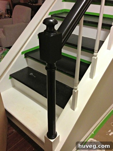 Partially painted black and white staircase