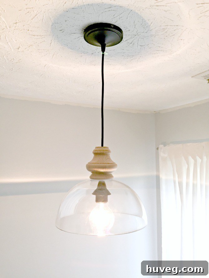 DIY Kitchen Light Fixture Lit After Successful Installation