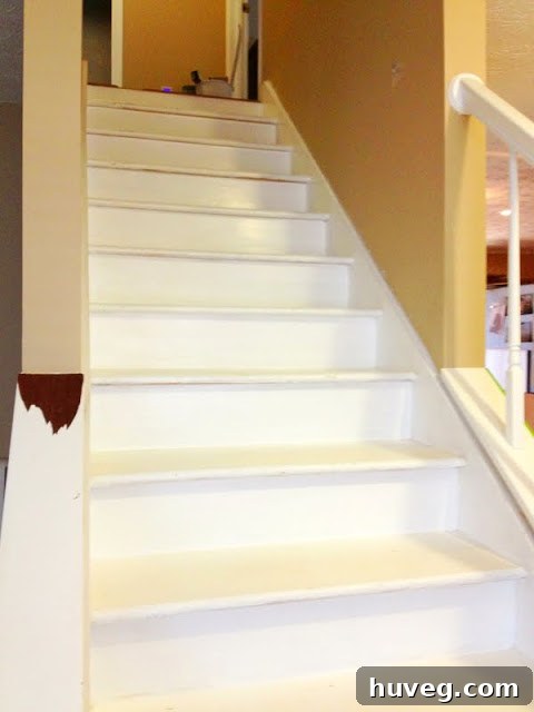 All-white staircase awaiting transformation