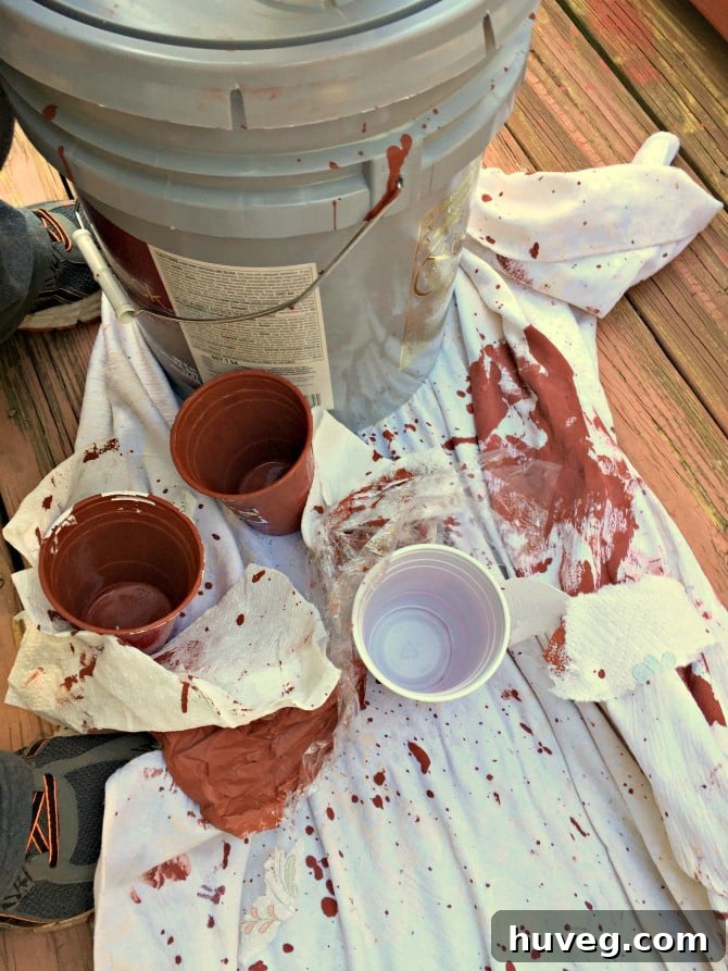 A sneak peek image of a DIY project in progress, resembling a 'crime scene' with tools and materials, hinting at a new home renovation reveal.