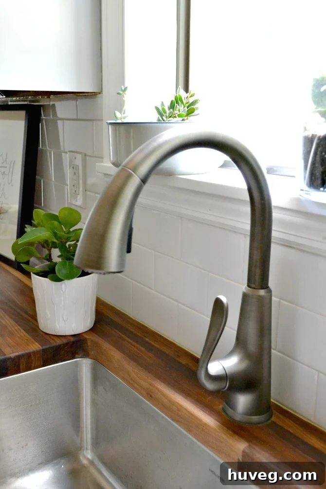 Kitchen makeover featuring Pfister faucet with front-mounted handle