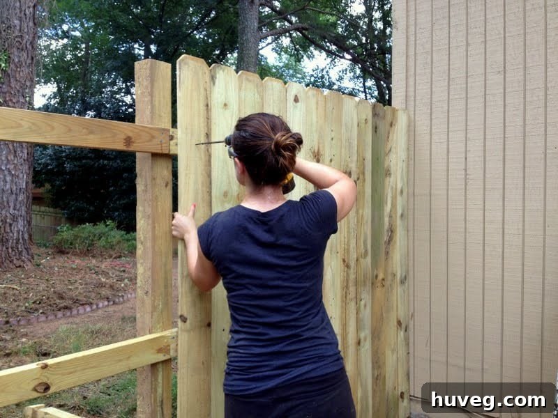 how to install a wooden fence for improved aesthetics