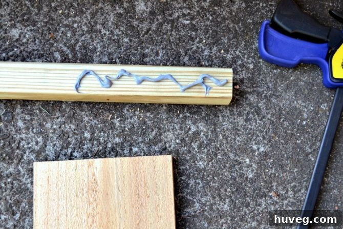 Spread the Liquid Nails on the wooden pieces and use clamps to hold them together.