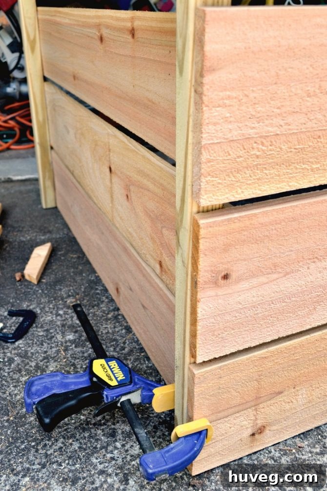 The side panels were held in place with clamps as I let the Liquid Nails dry