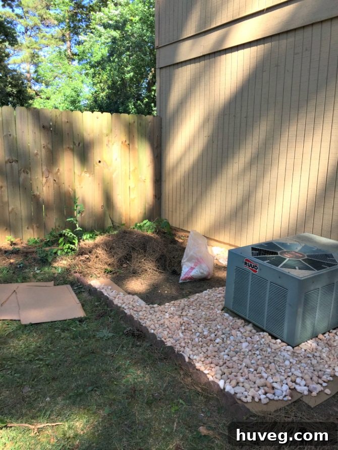Filling in AC unit area with landscaping rock