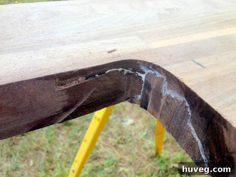 Initial cut for the undermount sink opening in the butcher block countertop