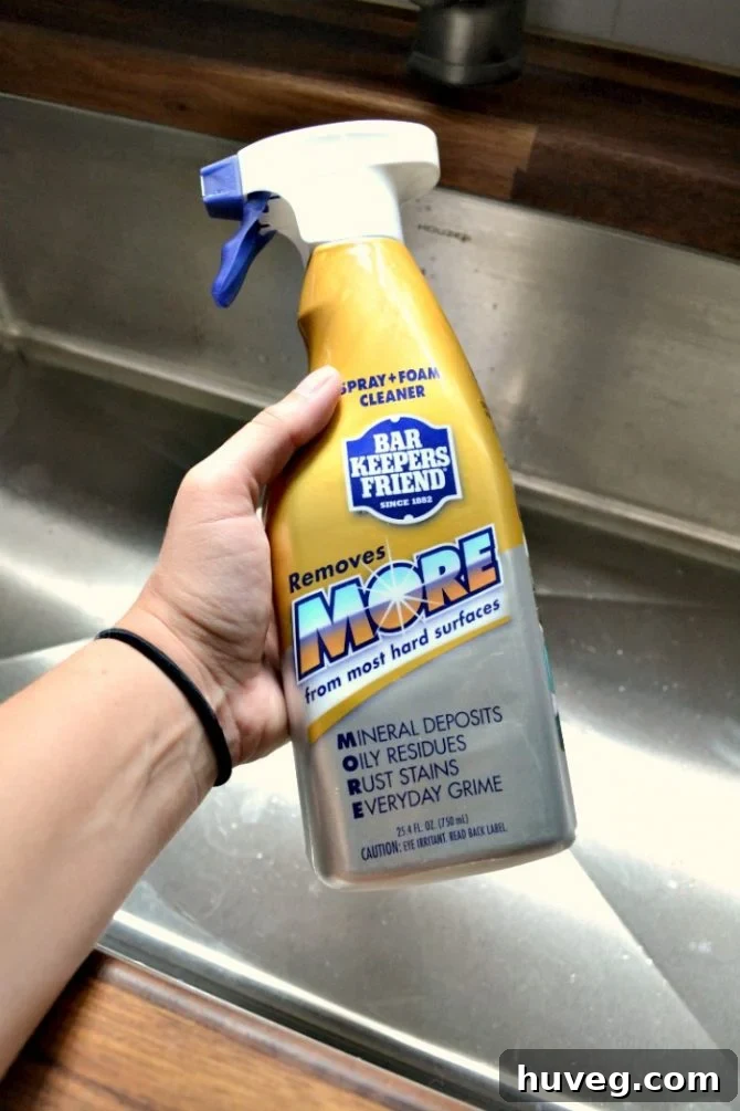 Demonstration of using Bar Keepers Friend to restore shine to a stainless steel sink