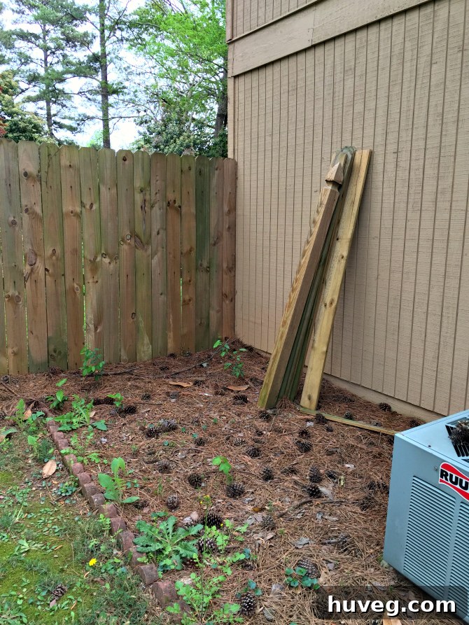 Side of house before landscaping, showing the neglected AC unit area