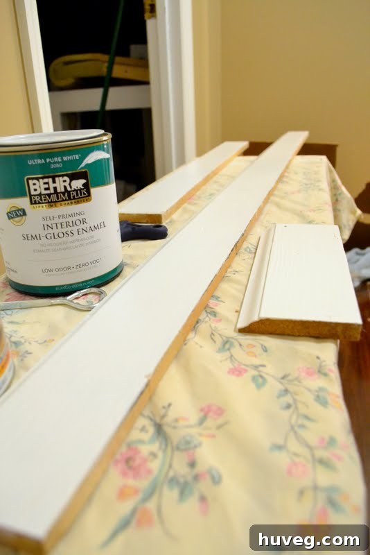 Painting old baseboards for a refreshed and modern look