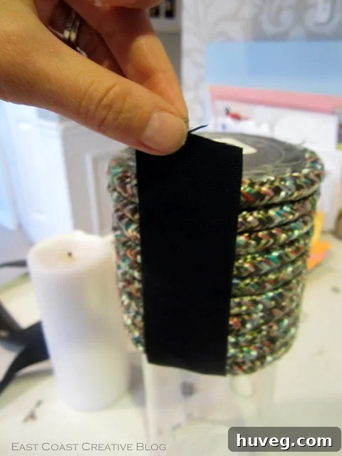 Glue ribbon to the underside of the vase