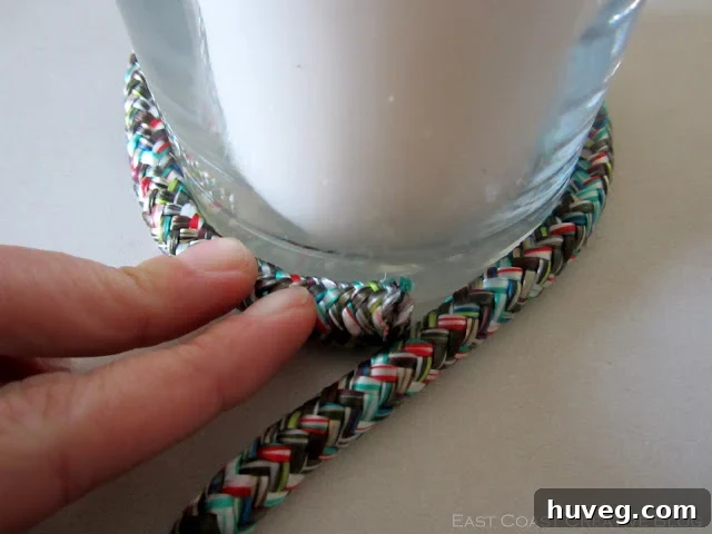 Wrap rope around hurricane vase base