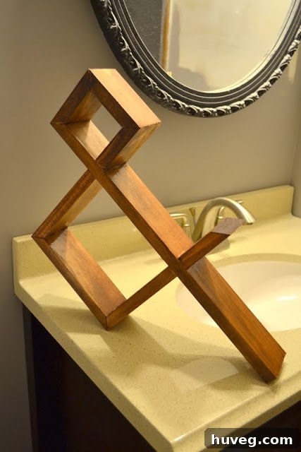 Stylish wooden ampersand in renovated bathroom