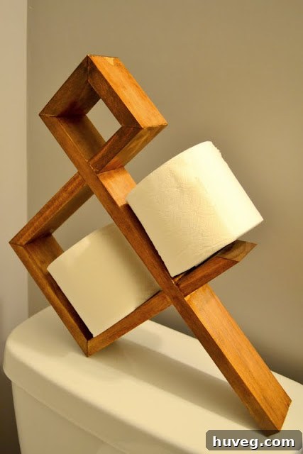 Close-up of toilet paper storage with ampersand