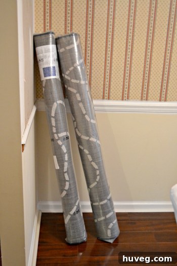 Two identical 4x6 area rugs laid out, with plans to join them to create a larger, custom rug.