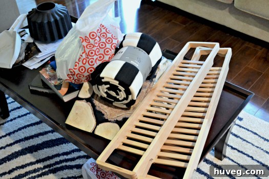 A collection of four bamboo shelves from Ikea clearance, stacked for repurposing projects, amidst other household items.